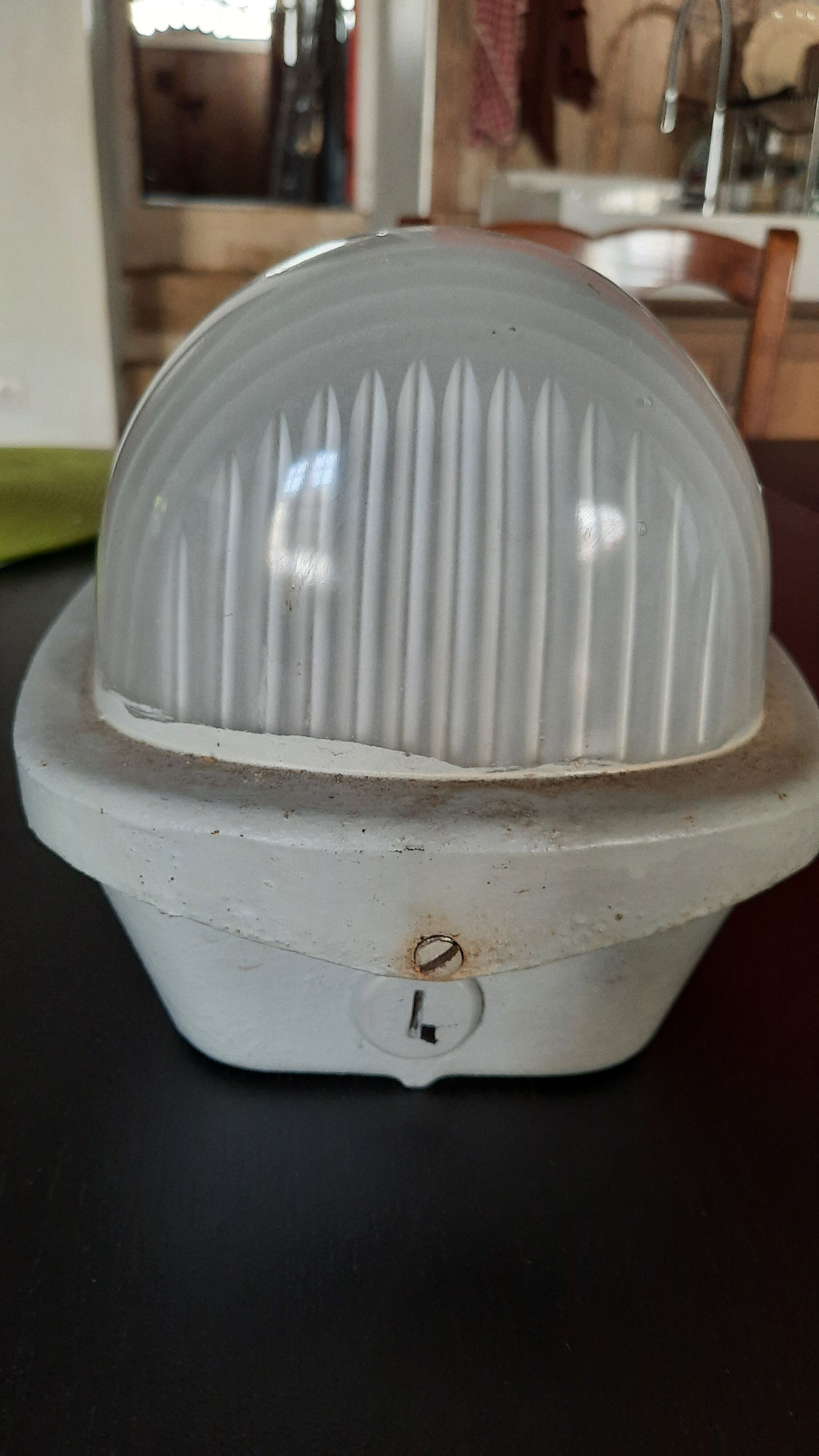 Holophanous cast iron wall lamp