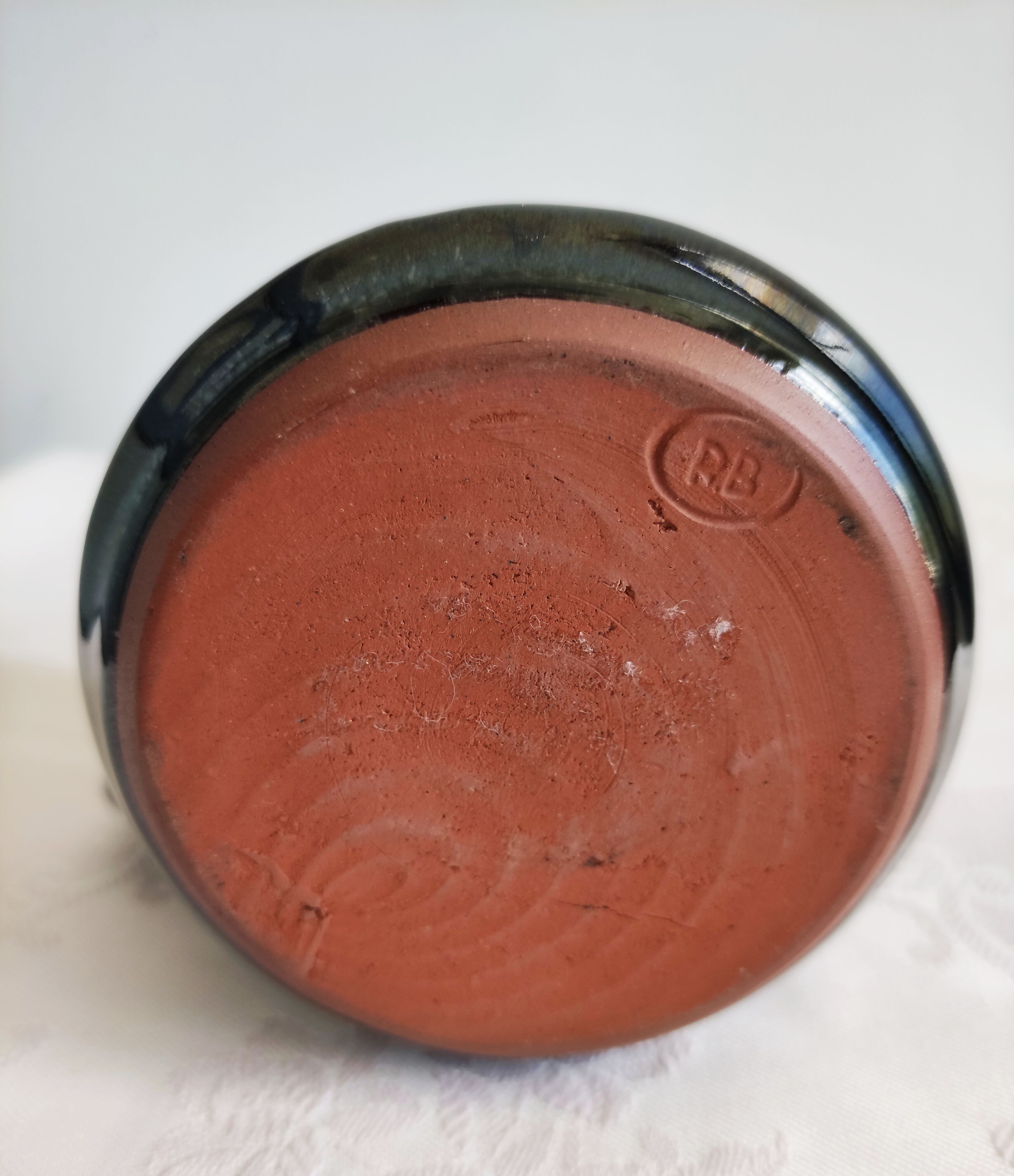 Blue enamelled terracotta mug