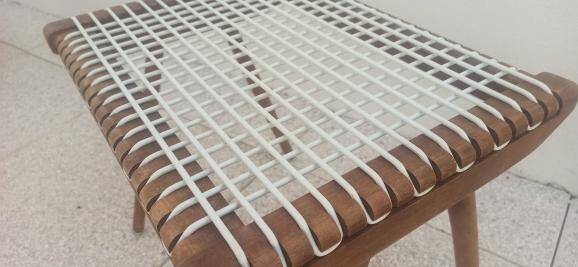 Footrest Georges Tigien, from the 60s. Light teak structure