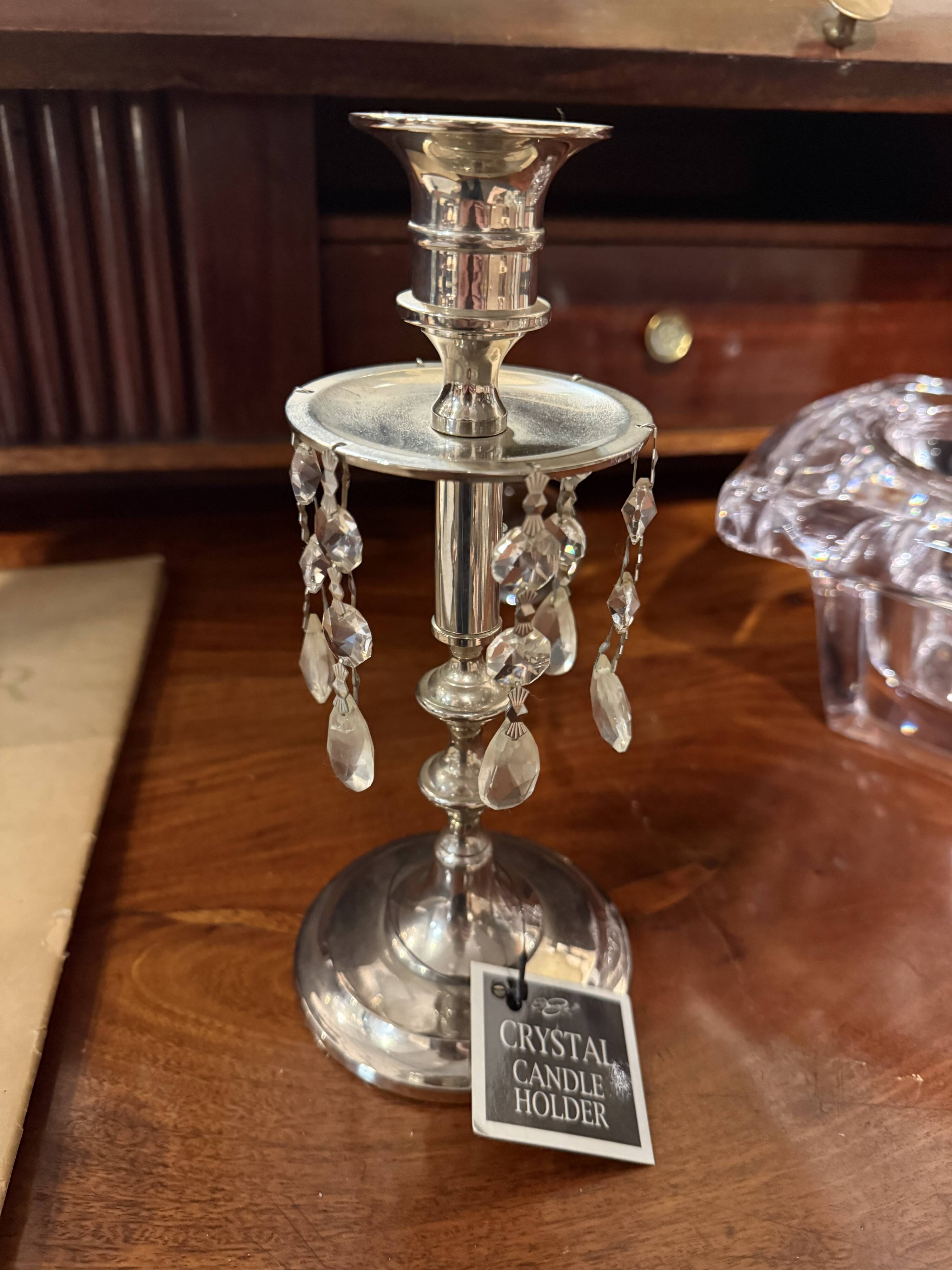 Crystal chandelier and silver-plated metal.