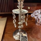 Crystal chandelier and silver-plated metal.