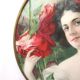 Round wall medallion frame, engraving of a woman with red roses, Art Deco