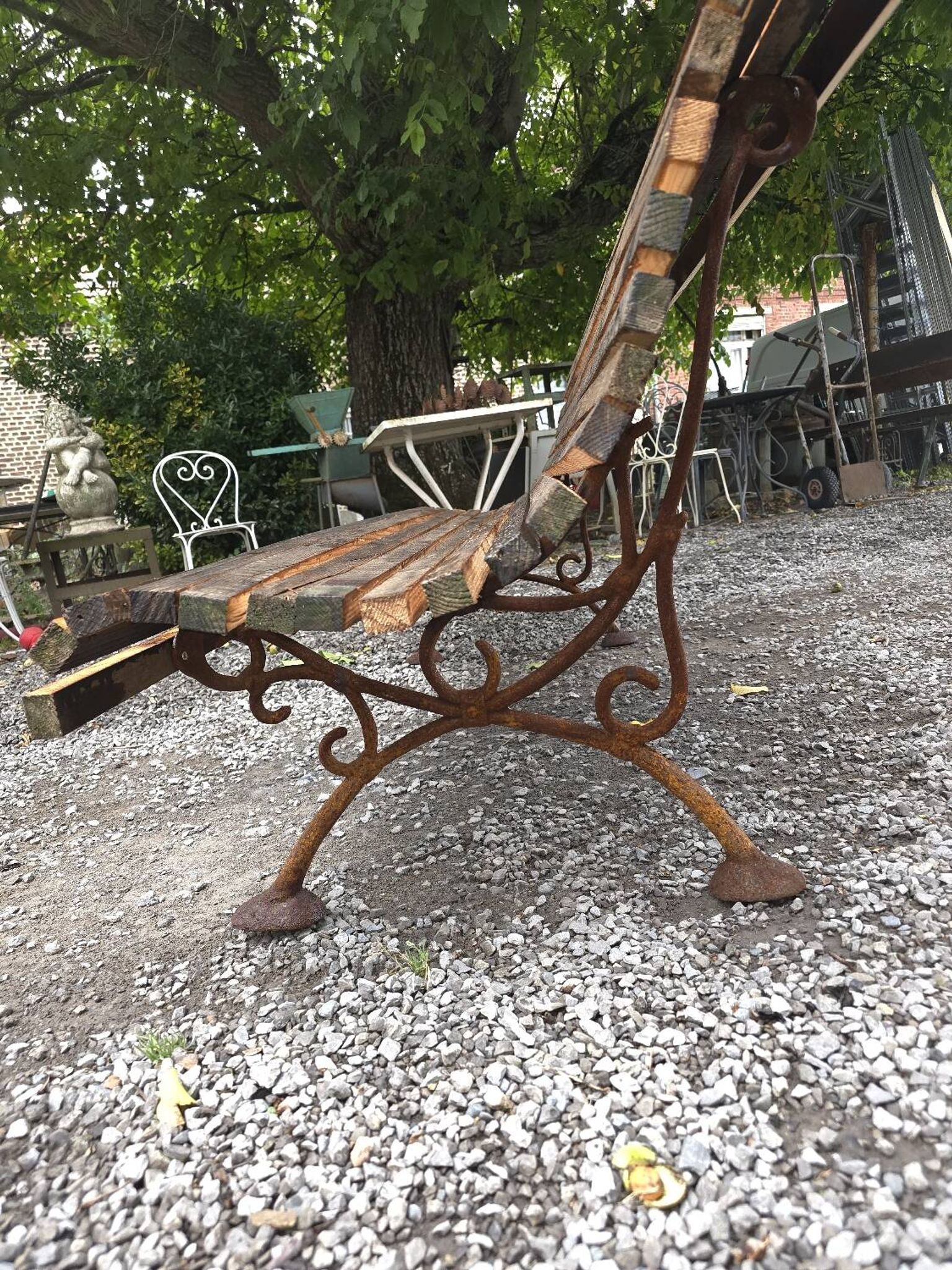 Cast iron garden bench with wooden slats