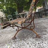 Cast iron garden bench with wooden slats