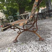 Cast iron garden bench with wooden slats