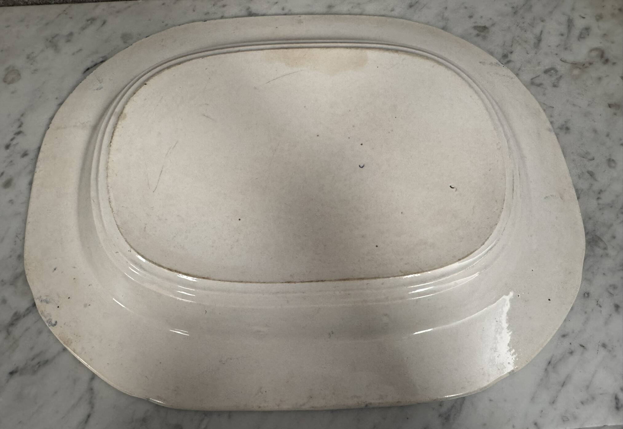 England, 19th century: large blue and white earthenware dish