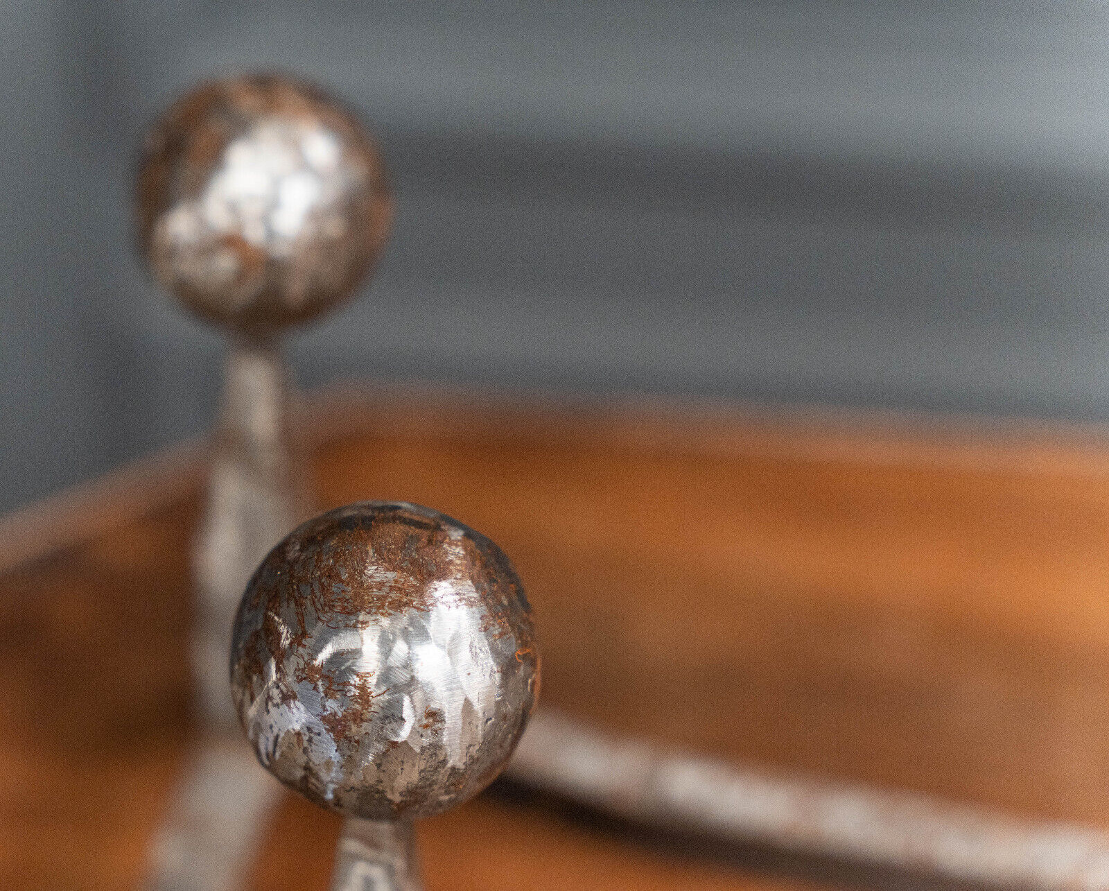 Pair of 1930 modernist chenets decorated with a ball