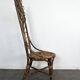 Set of 4 bamboo and rattan chairs with sunflower decoration.