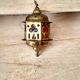 Suspension lantern in moucharabieh brass, colored windows