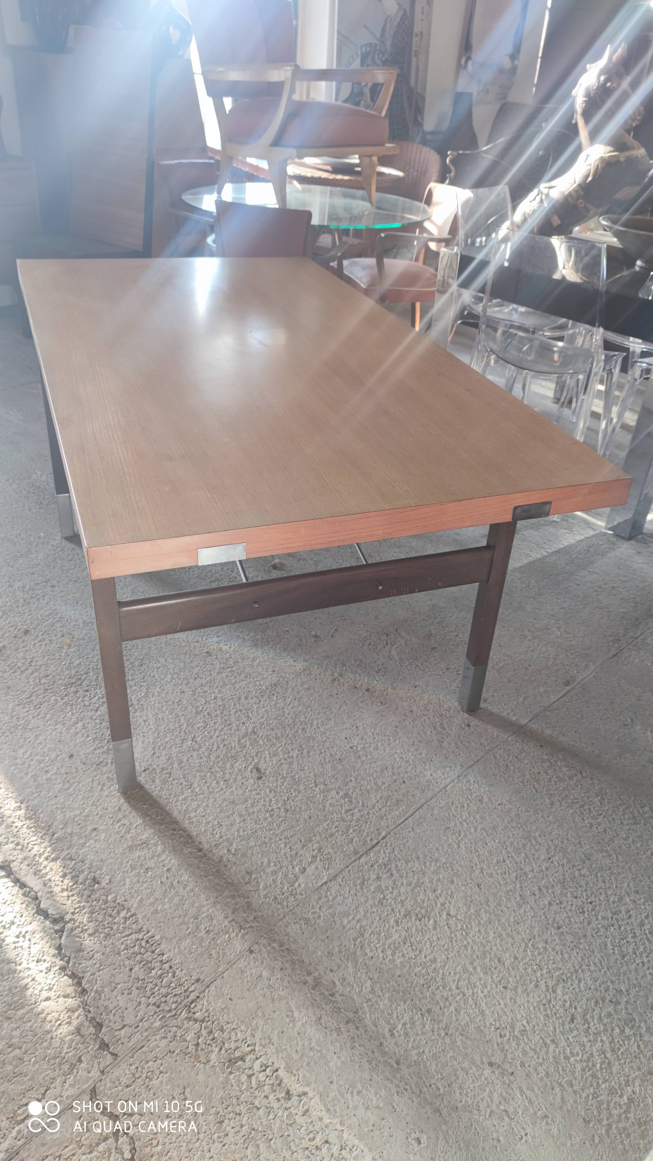 Extendable dining table in walnut, mahogany and chrome, circa 1960