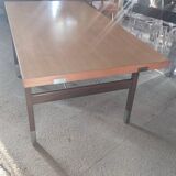 Dining table with extensions in walnut and mahogany and chrome around 1960