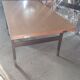 Extendable dining table in walnut, mahogany and chrome, circa 1960