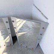 Pair of "Memphis" mirrors from the 80s in chrome and wood.
