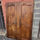 Paire de portes de placard style Louis XV en merisier massif