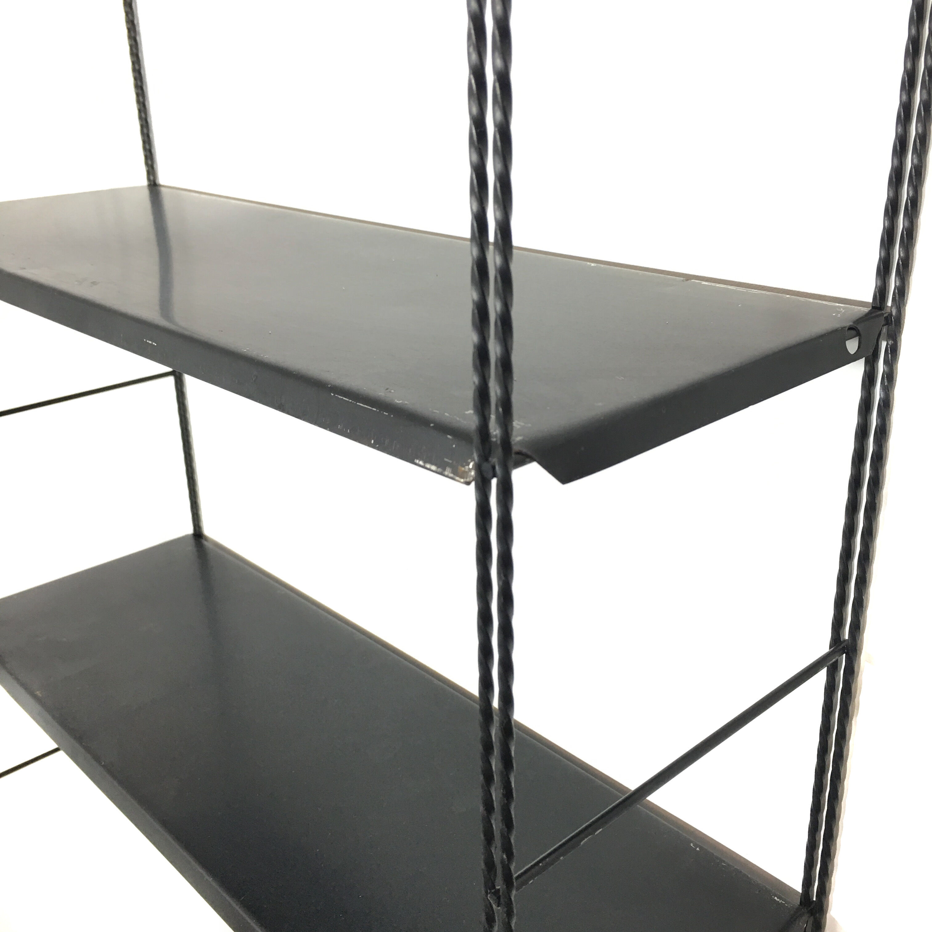String black metal shelf