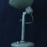 Industrial metal parabola lamp.