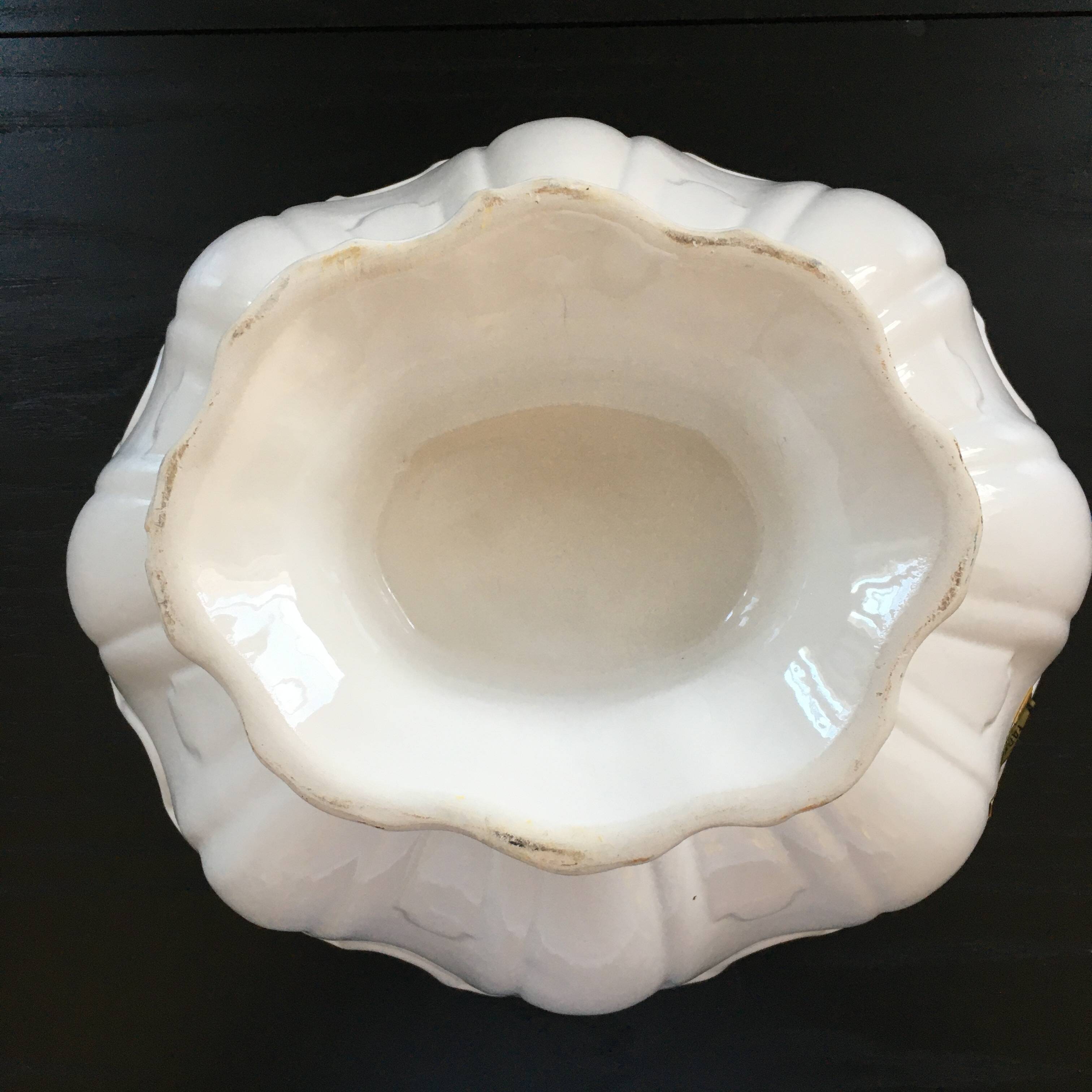 Large white scalloped cup