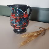 Glazed ceramic pitcher