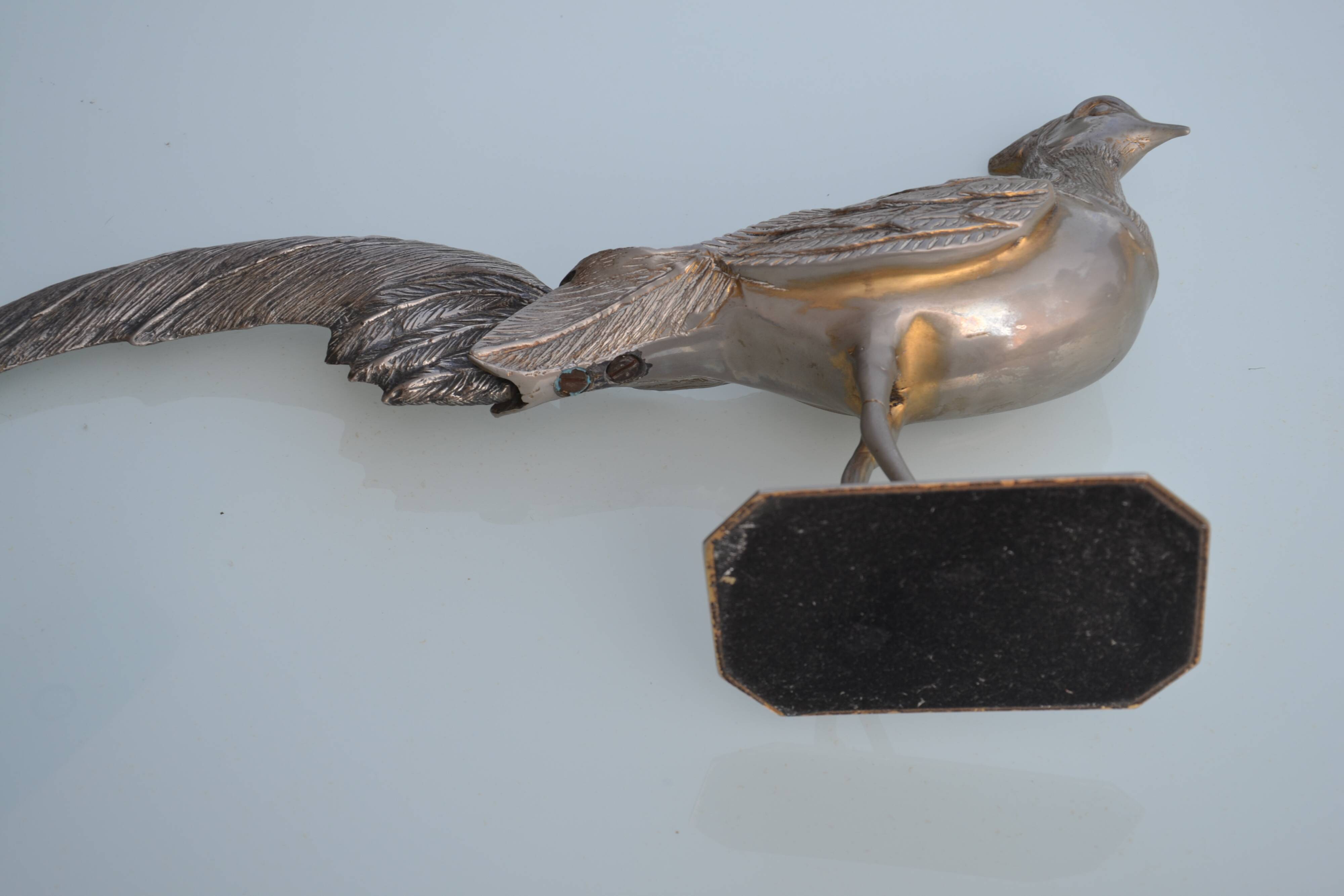 Brass peacock sculpture