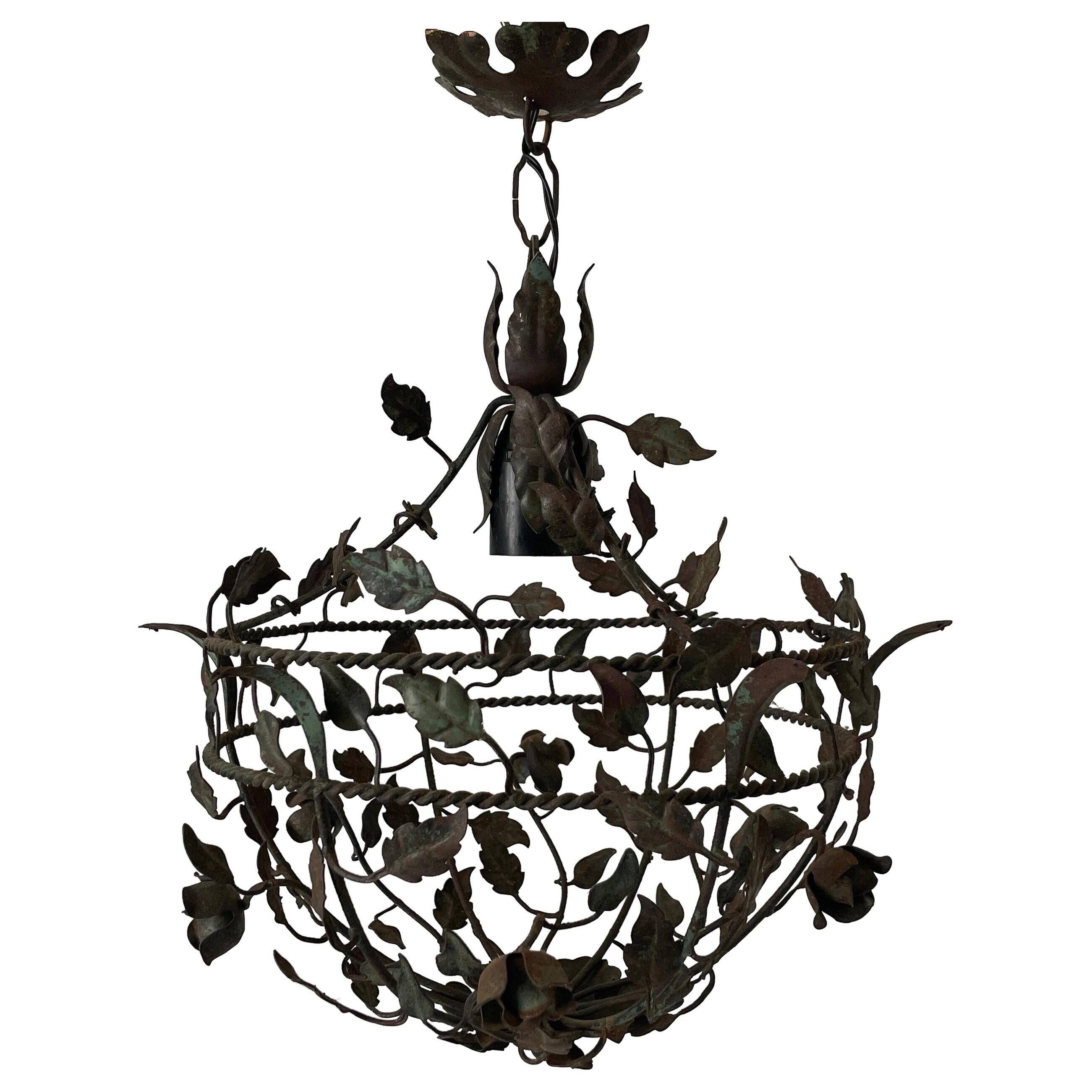 Patinated metal ceiling light with a floral and leaf pattern, 1950s, Italy.