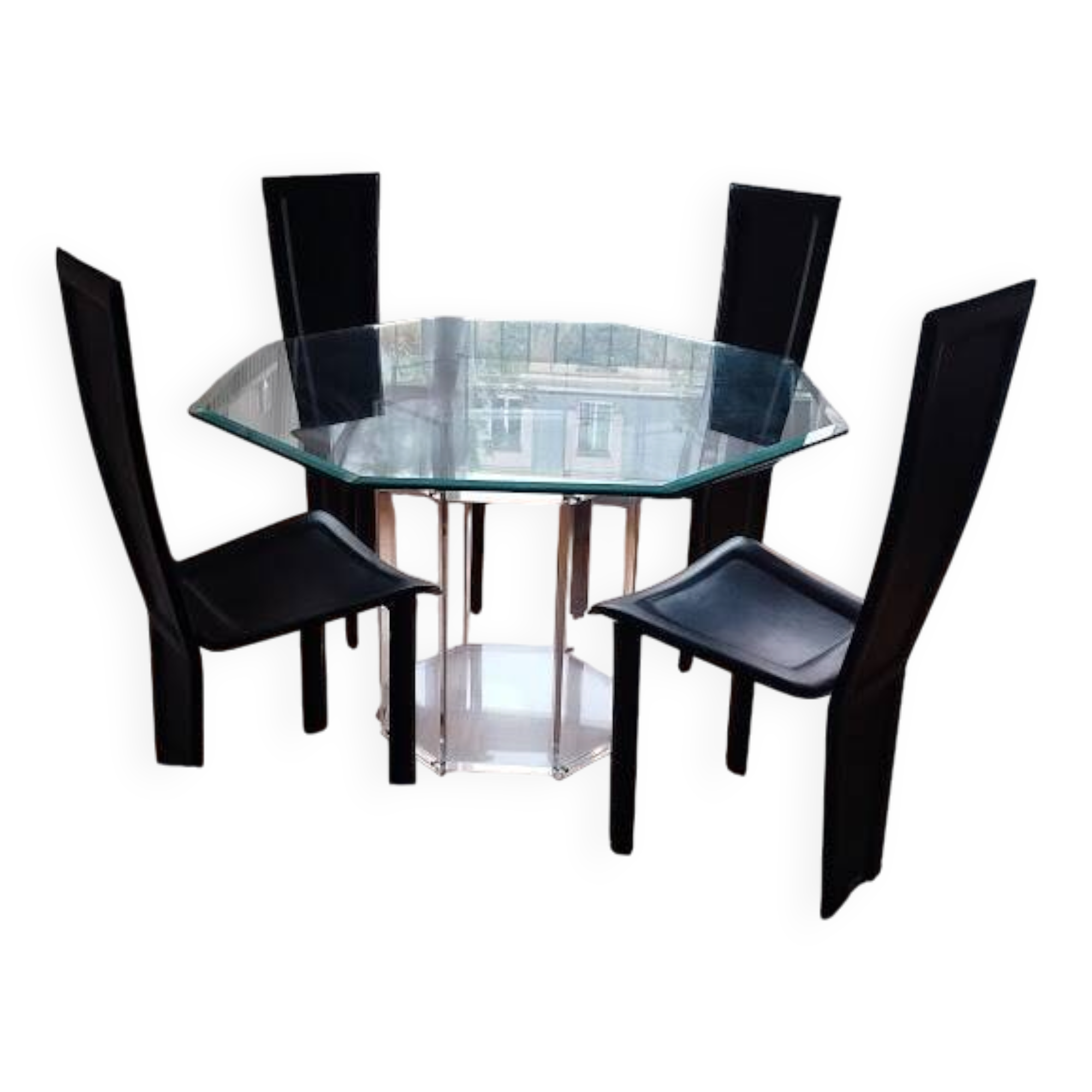 For sale: bevelled glass table and Artedi leather chairs.