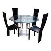 For sale: bevelled glass table and Artedi leather chairs.