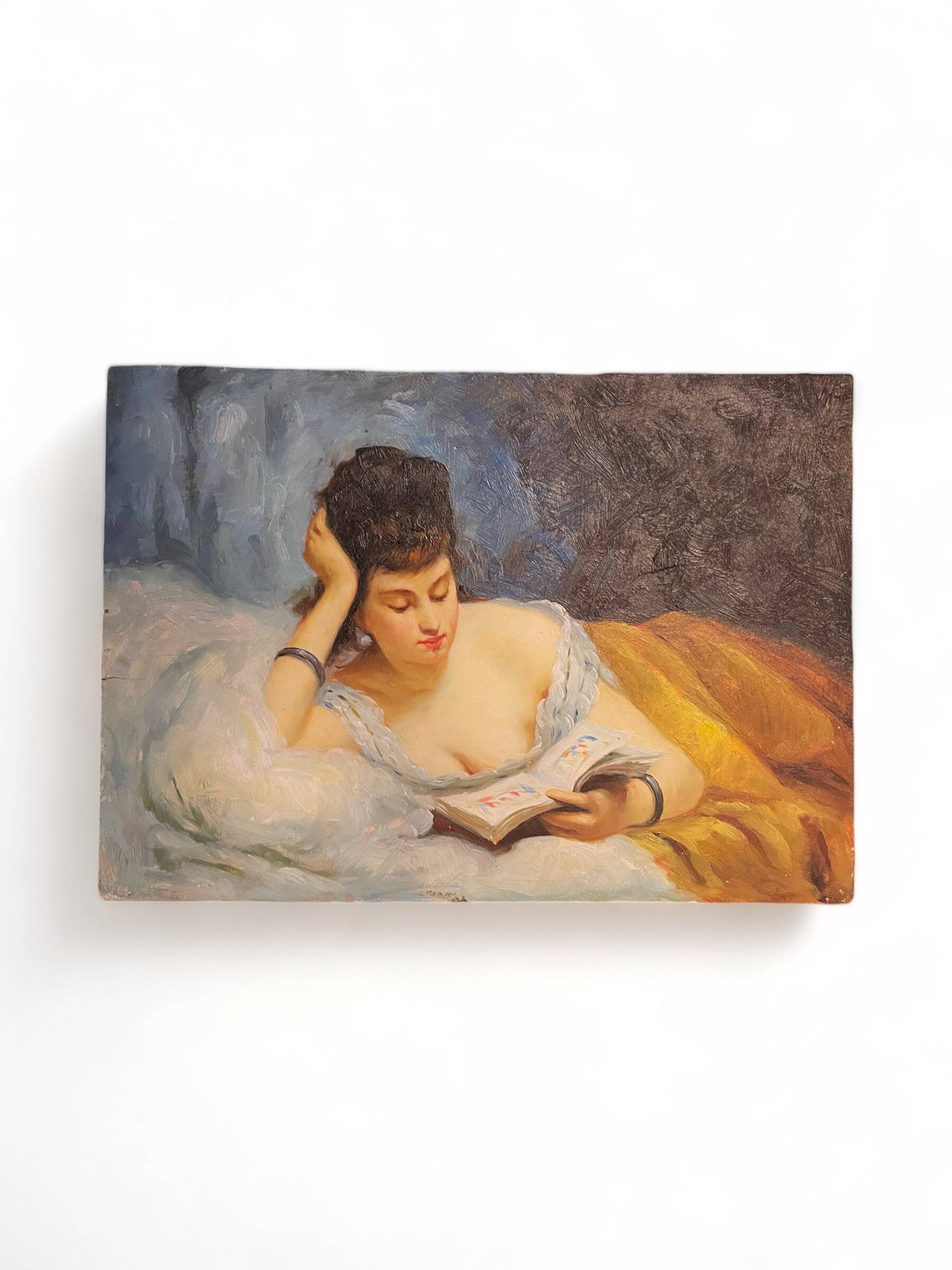 Young woman lying reading oil on panel