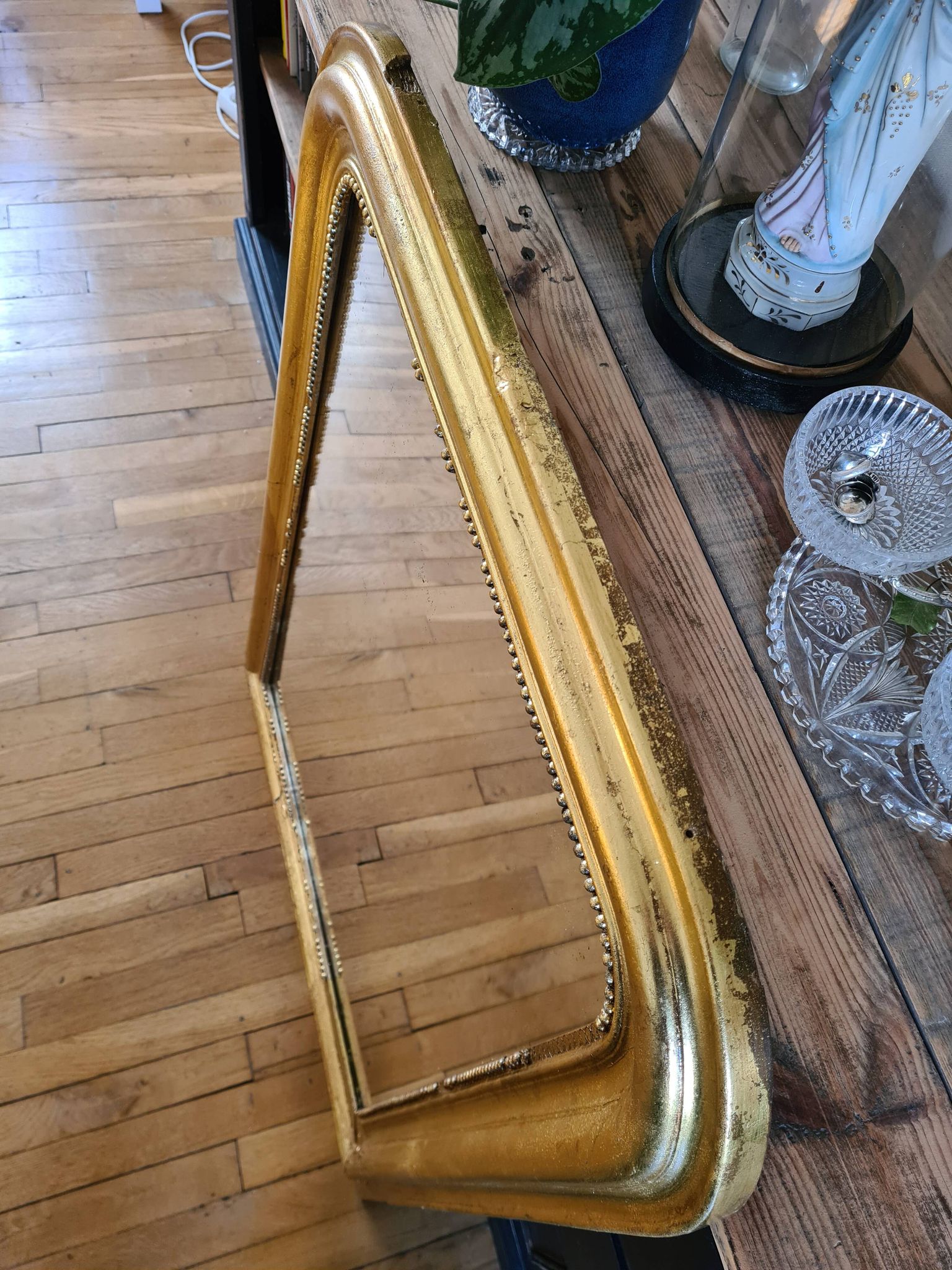 Old Louis Phillipe mercury mirror in gilded stucco with leaf