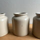 Old glazed stoneware mustard pots