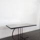 Chrome steel coffee table with zodiac signs decoration.