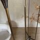Vintage reed floor lamp in black metal and brass with three white opalines