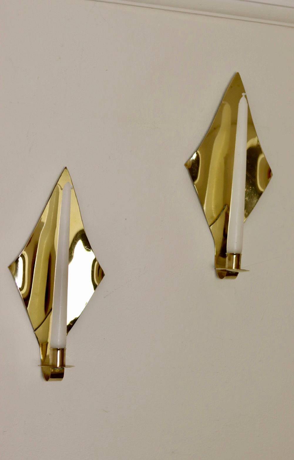 Pair of Swedish brass wall sconces from the mid-century.