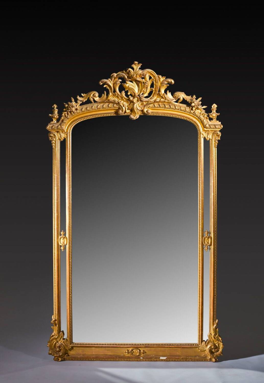 Large wooden and gilded stucco mirror with parecloses - 19th century