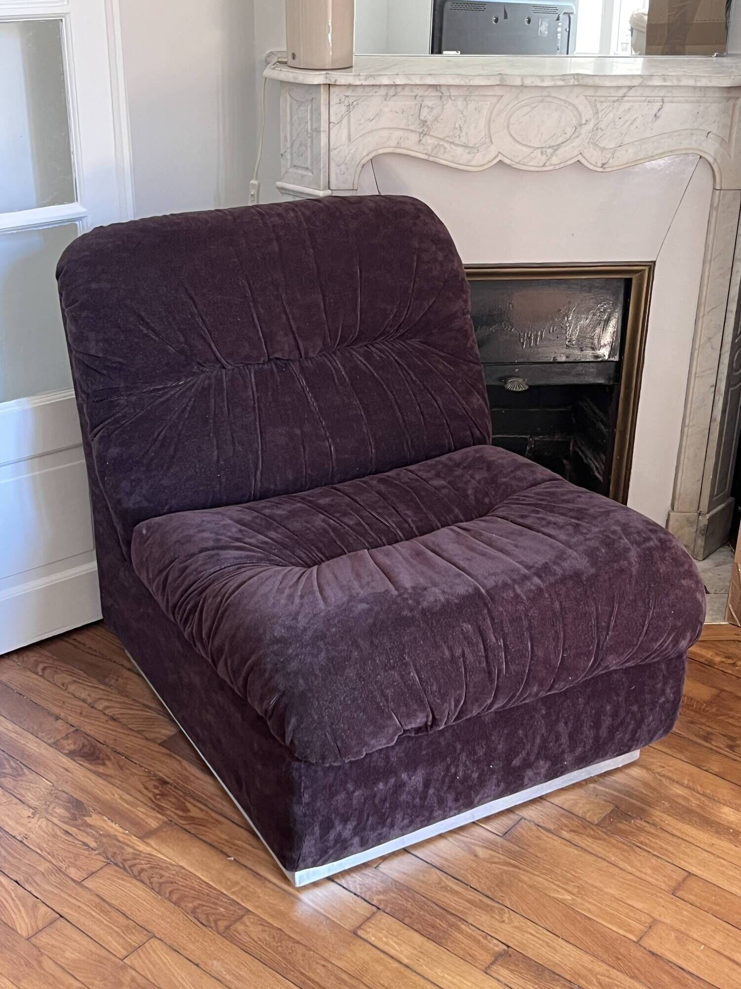 Vintage 1970s lounge chair in chocolate brown velvet with a chrome base.