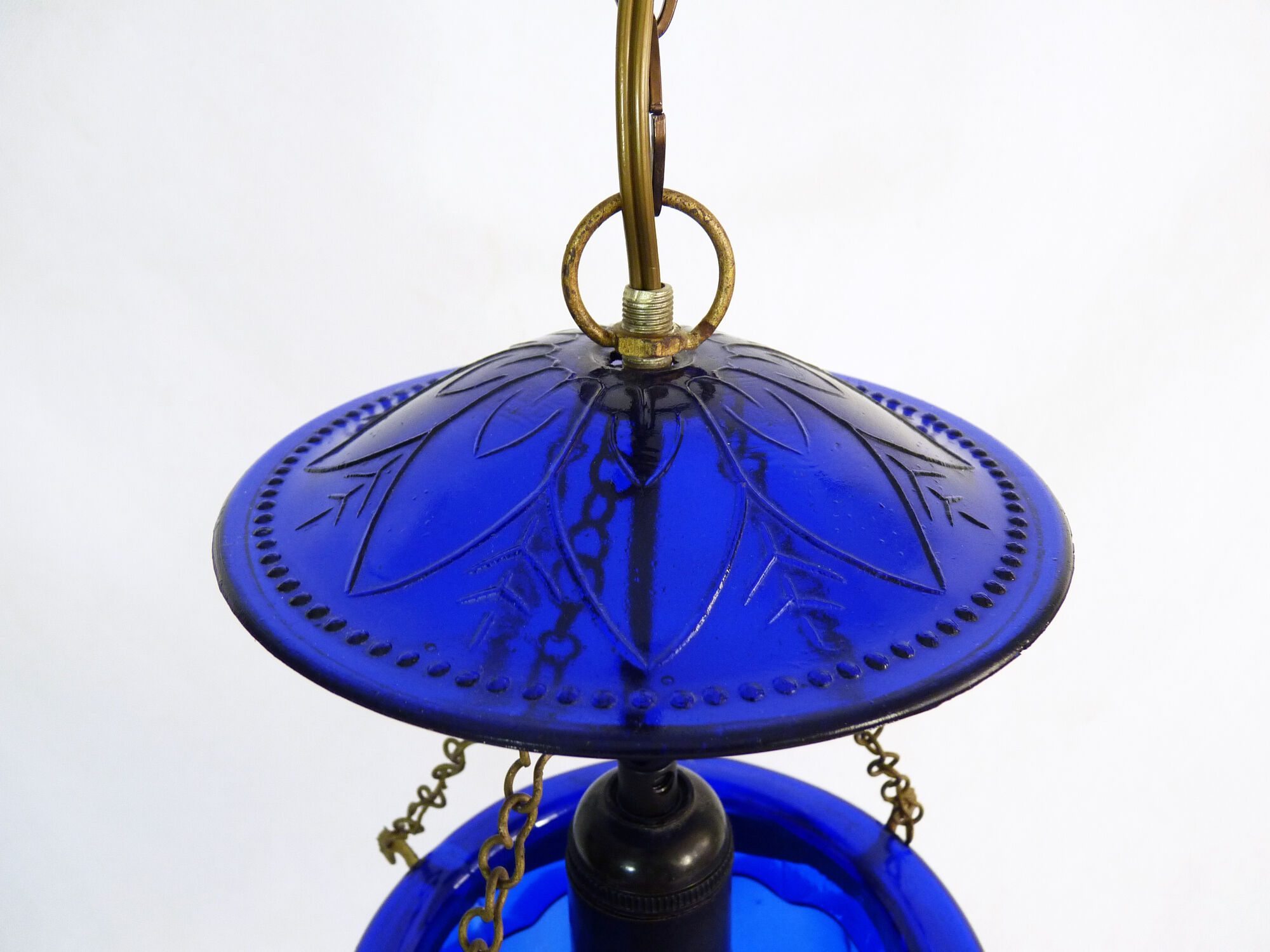 Suspension chandelier, oriental blue glass lantern and brass structure. Year 70-80
