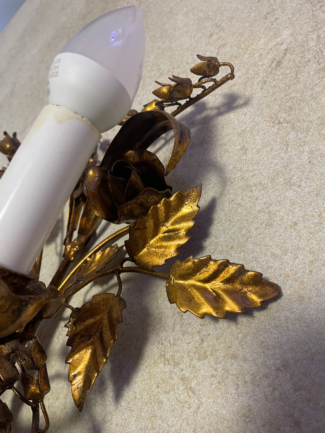 Wall light in the style of Hans Kögl, mid-20th century.