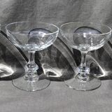 9 old champagne glasses in flat-waisted blown glass