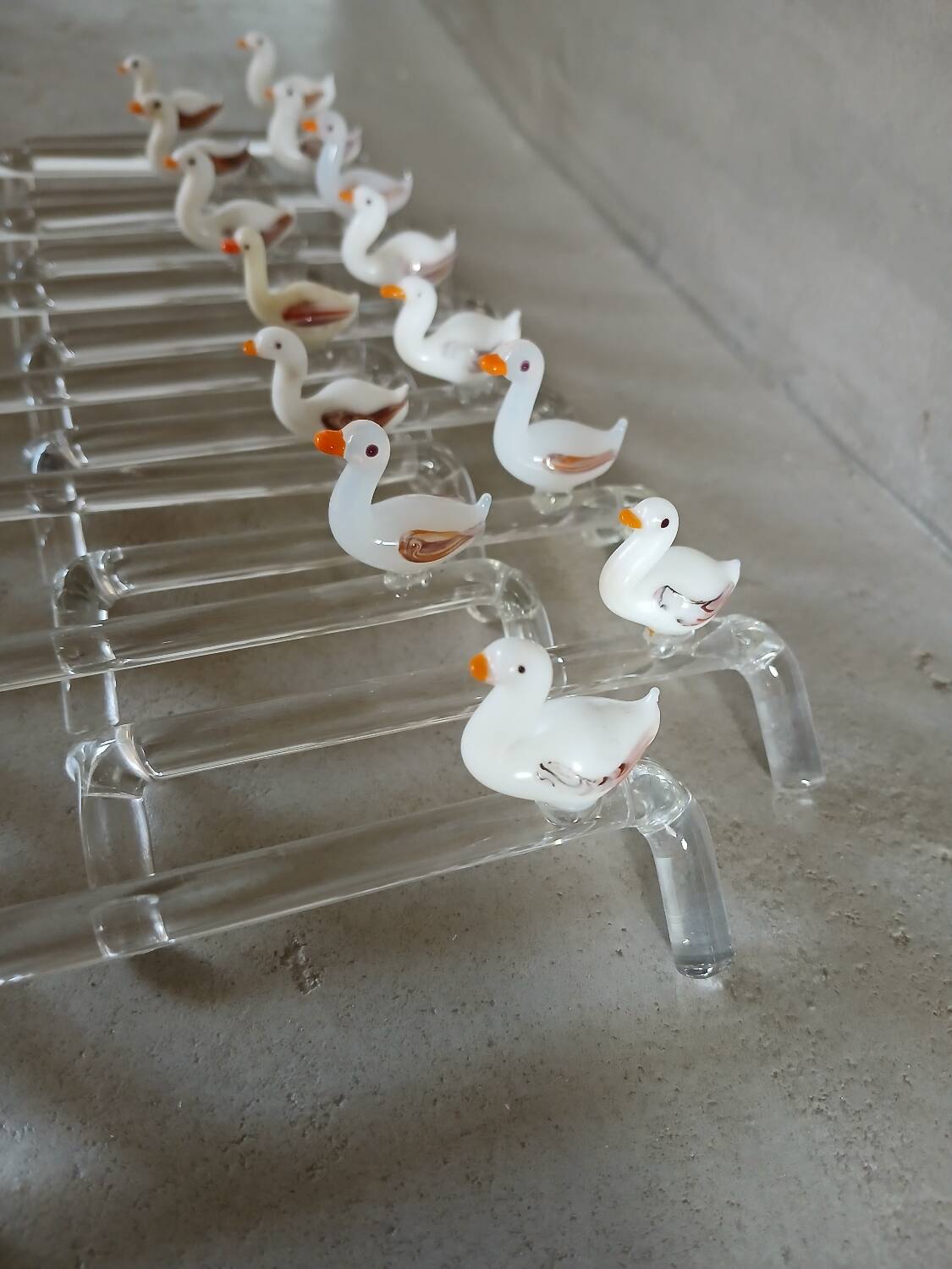 14 antique glass knife rests / ducks