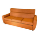 Vintage orange convertible sofa