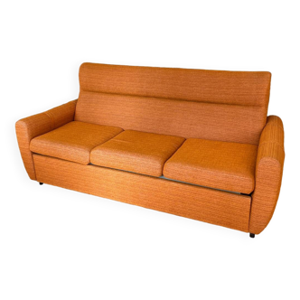 Vintage orange convertible sofa