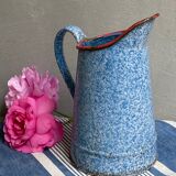 Old enamelled pitcher