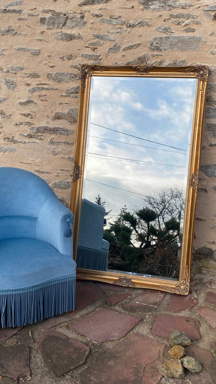 Large gilded carved wooden mirror