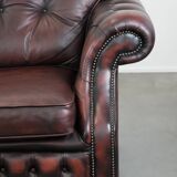 Red 2.5-seater Chesterfield sofa on wheels in English style