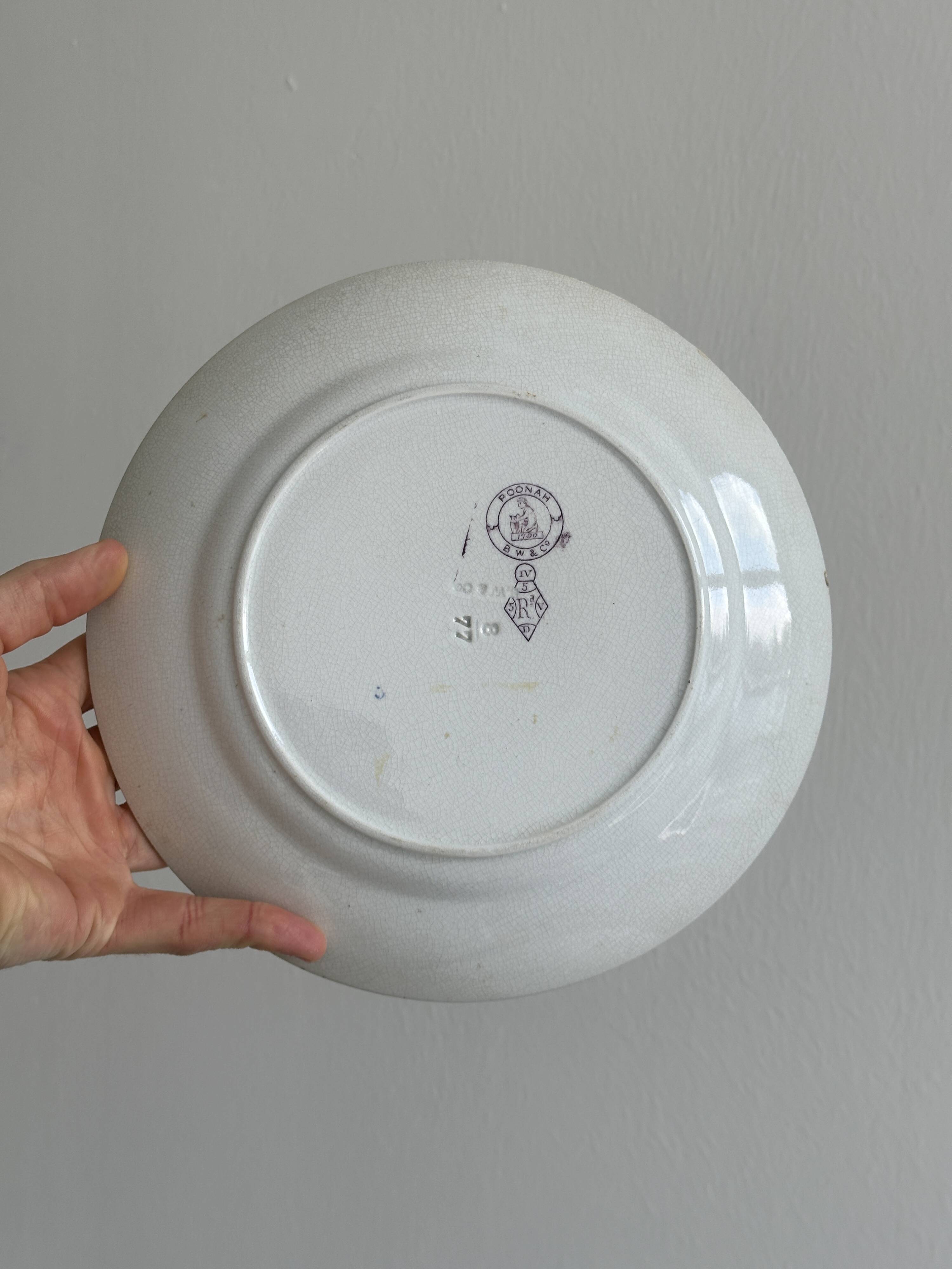 Plate with purple oriental decoration