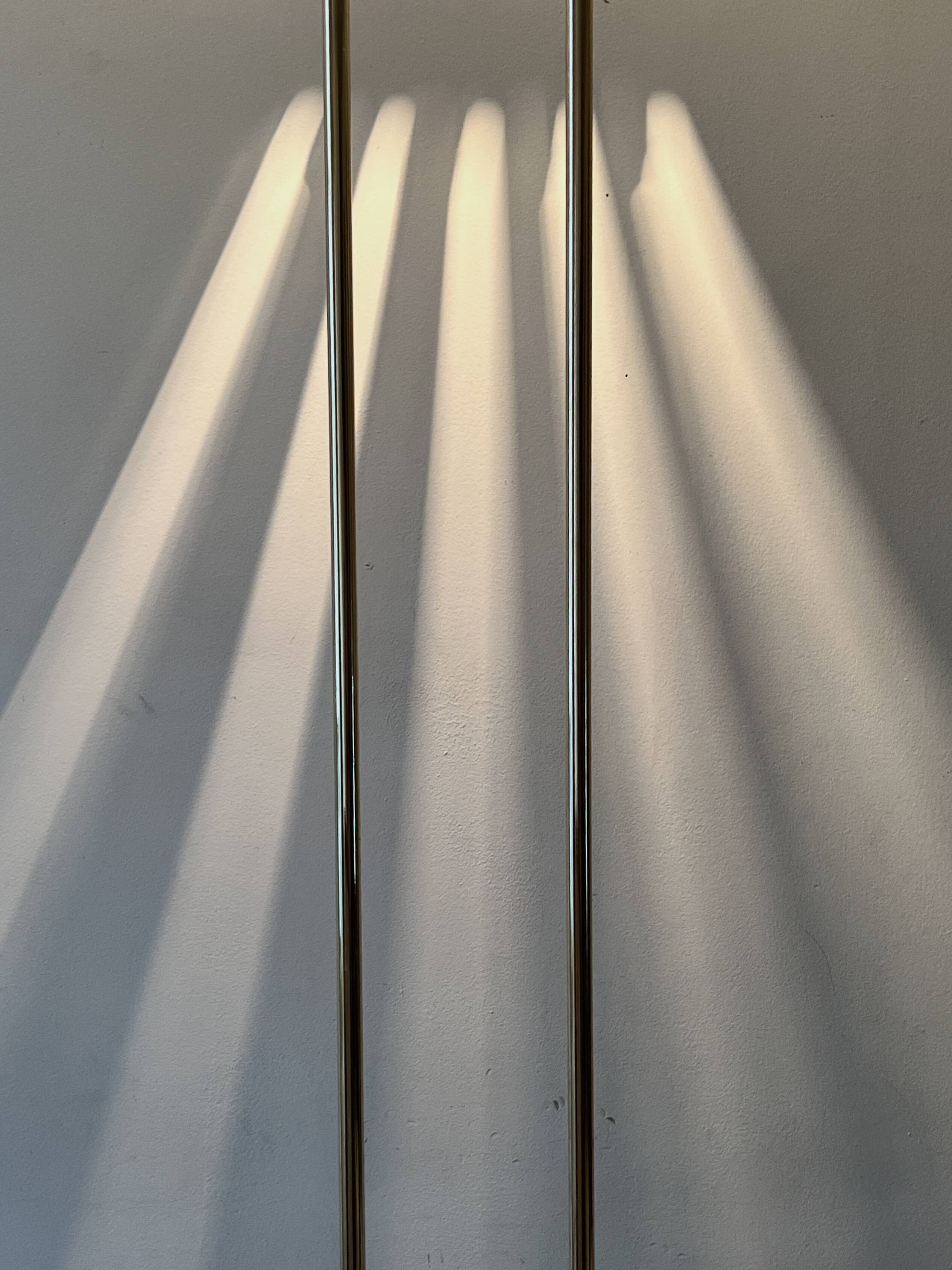 Modernist halogen floor lamp with a gold bowl, 1980.
