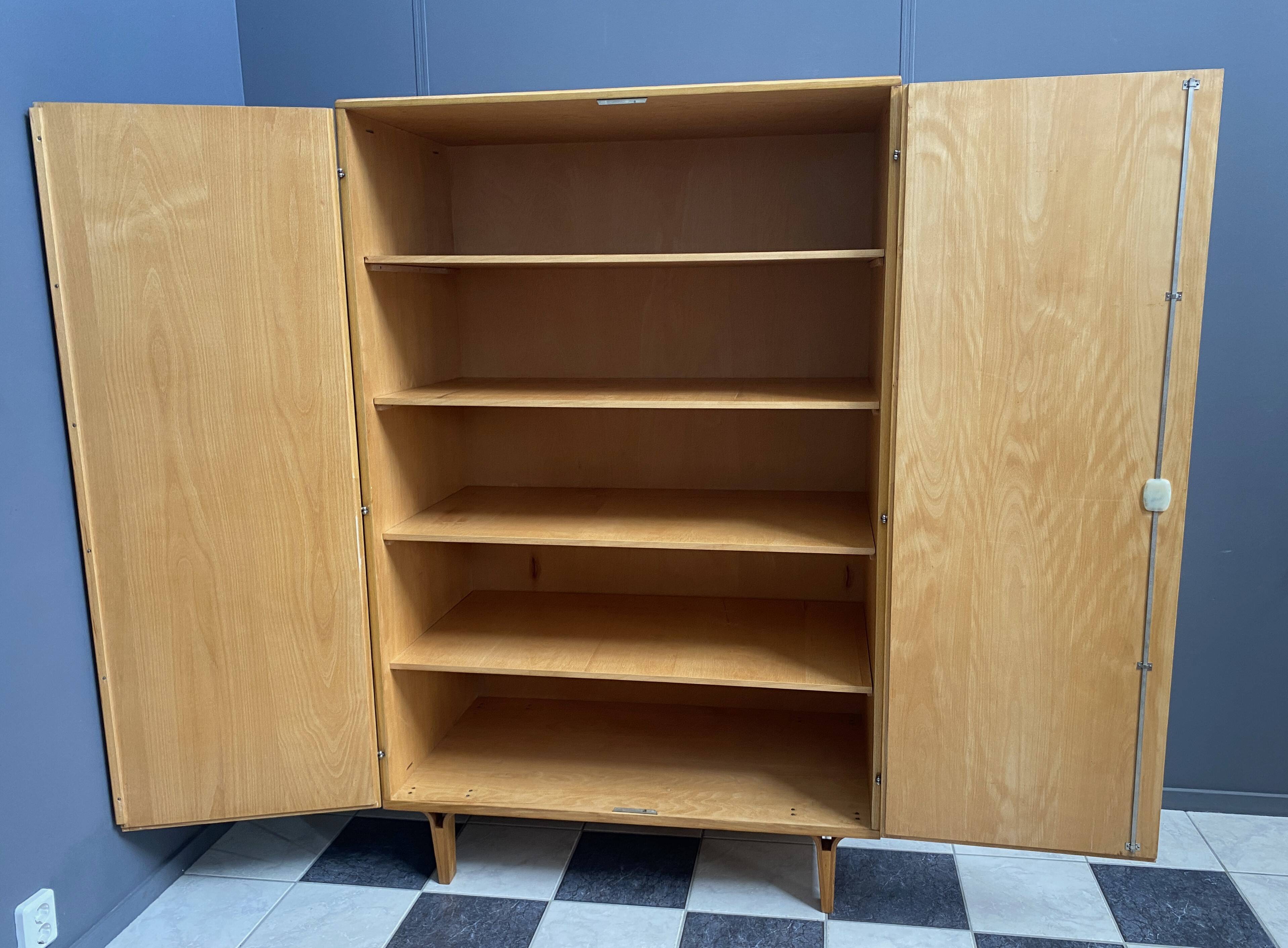 All shelf wardrobe cabinet in ash wood by františek mezulánik  for novy domov