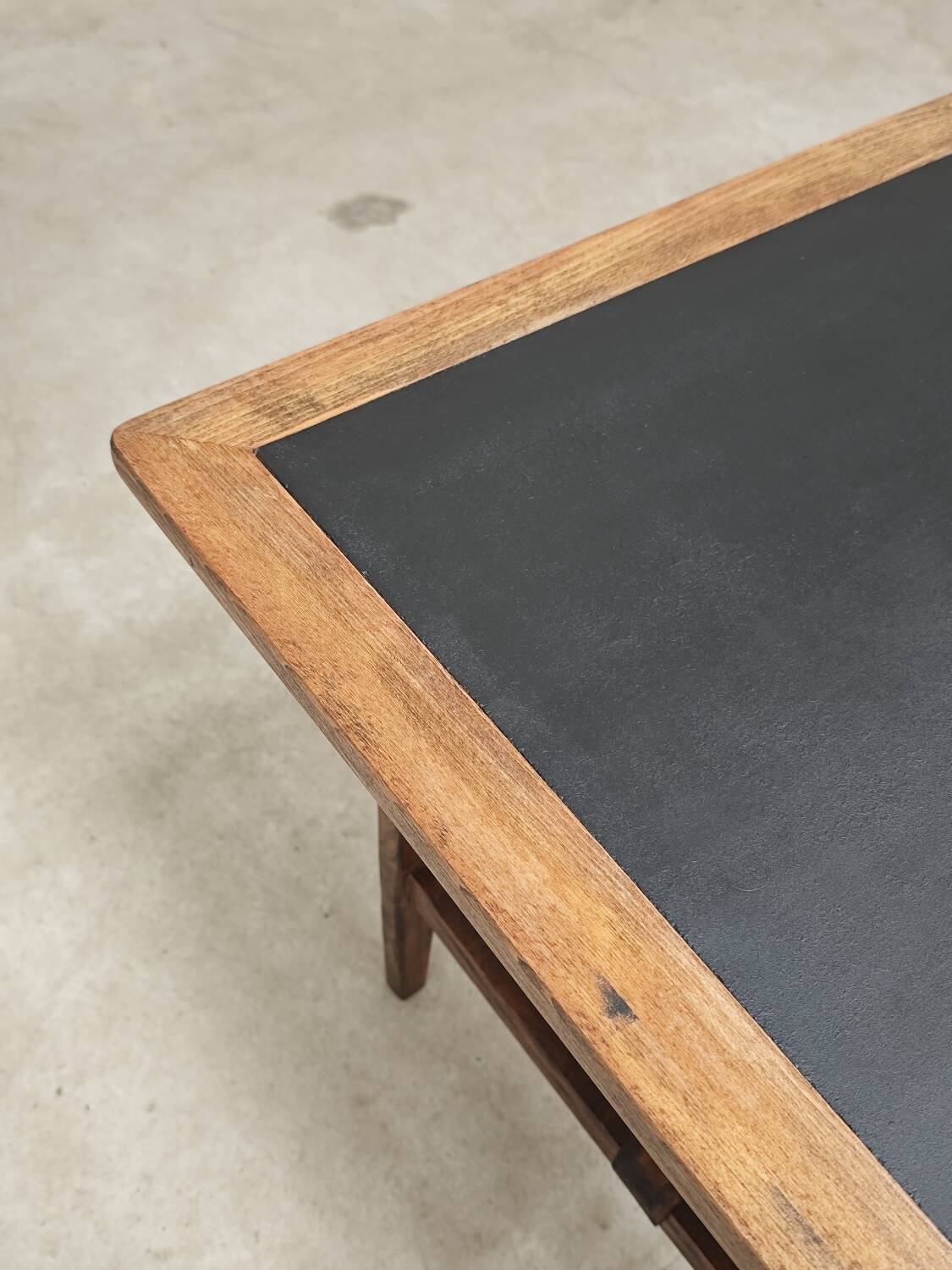 Vintage workshop folding table in oak with a hand-patinated black top.