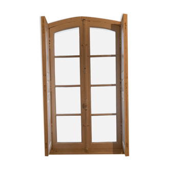 Window with interior shutters