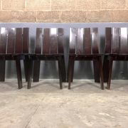 Brutalist and modernist dining chairs from the 1970s in architectural brown wood.