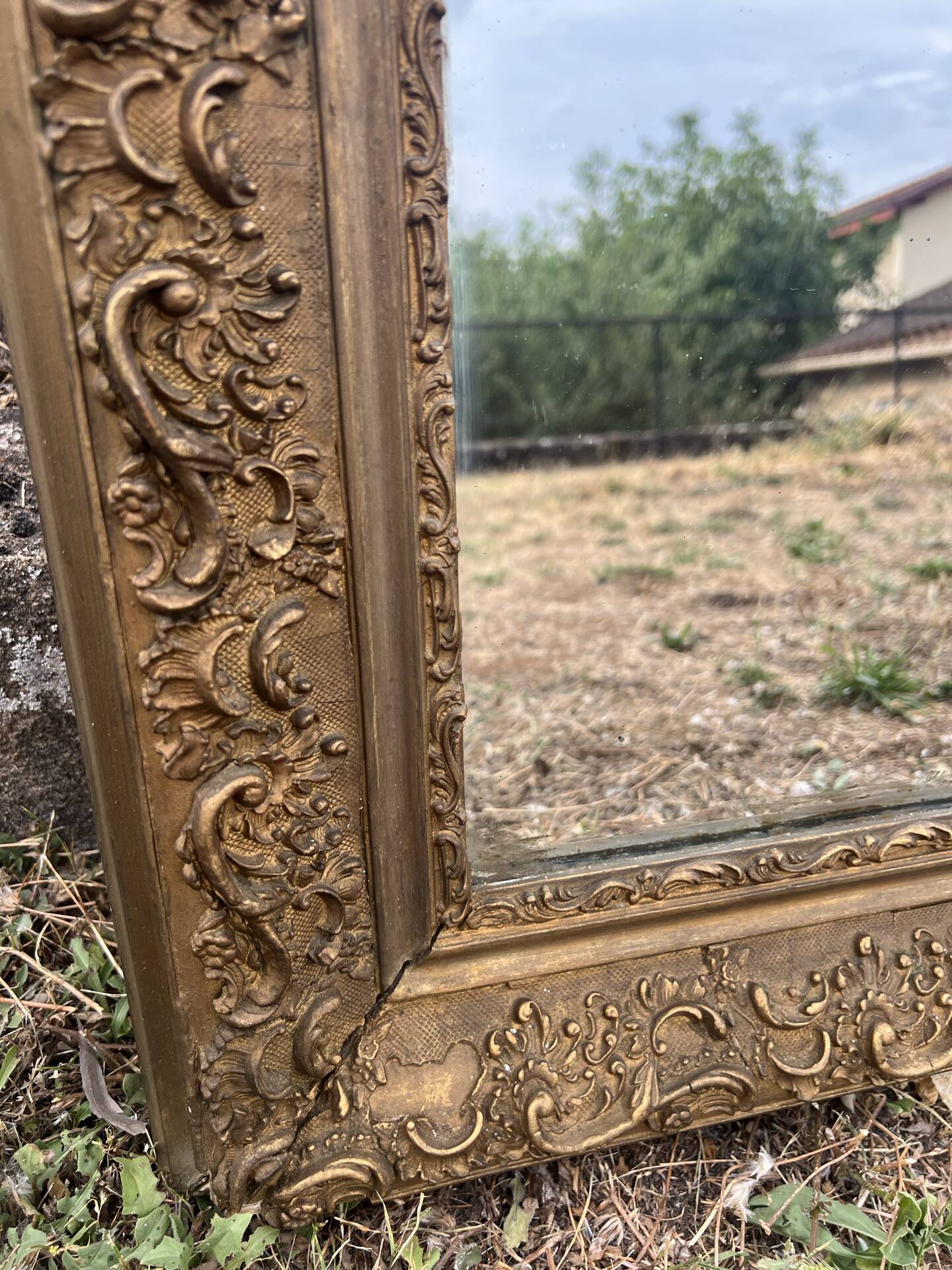 Large gilded sculpted Louis-Philippe mirror, mercury 104x77cm